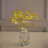 Yellow Blossoms in Crystal Vase